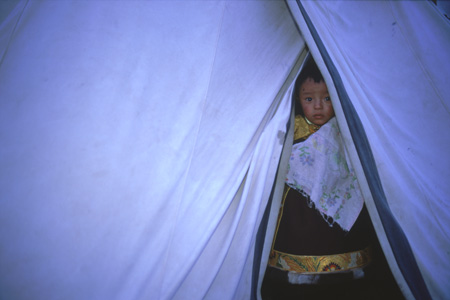 child in tent